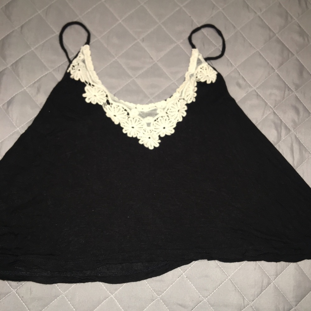 A black shirt with an embroidery